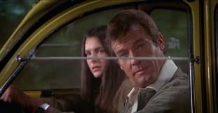 Carole Bouquet and Roger Moore