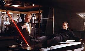 Sean Connery and Gert Frobe in Goldfinger