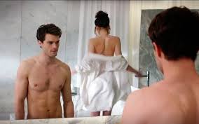 Jaime Dornan and Dakota Johnson in Fifty Shades of Grey