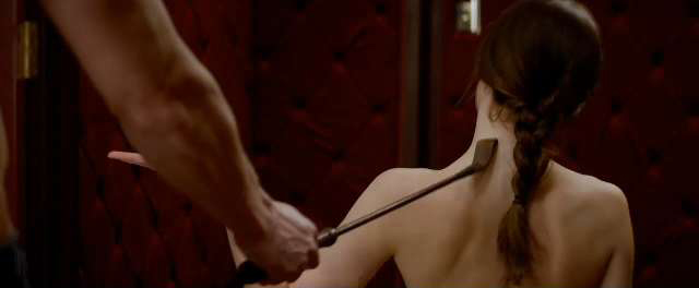 Jaime Dornan and Dakota Johnson in Fifty Shades of Grey