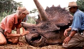 Laura Dern and Sam Neill with a sick Tricerotops in Jurassic Park