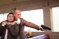 Bruce Willis and Joseph Gordon-Levitt in Looper