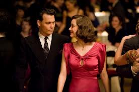 Johnny Depp and Elena Kenney in Public Enemies