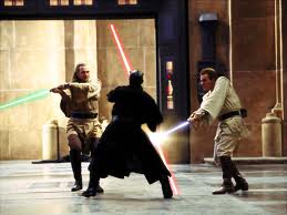 Liam Neeson, Ray Park and Ewan MacGregor square off in Star Wars: The Phantom Menace